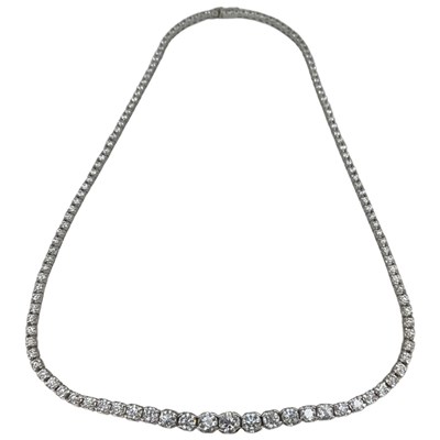 Lot 31 - An 18ct White Gold Diamond Rivi`ere Necklace