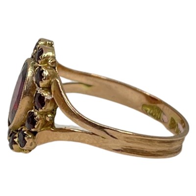 Lot 4 - An Antique Gold Garnet and Paste Cluster Dress Ring, circa 1860.