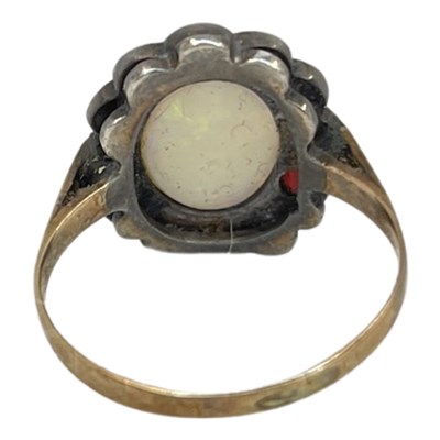 Lot 3 - An Antique Opal and Garnet Cluster Dress Ring.