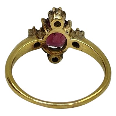 Lot 10 - A Victorian Garnet and Diamond Cluster Ring.